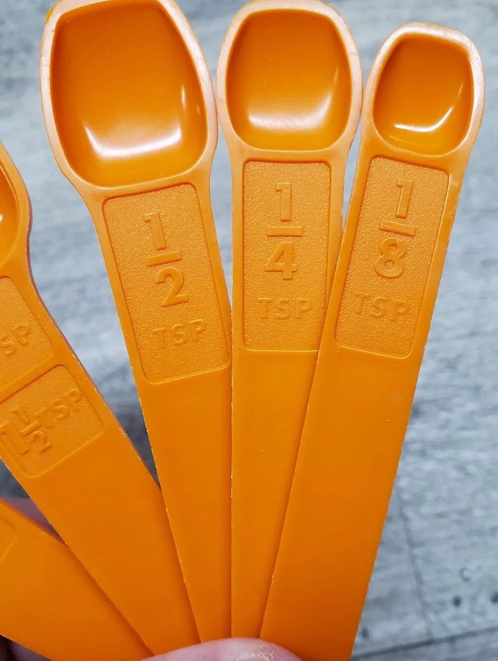 Vintage Tupperware orange measuring spoons